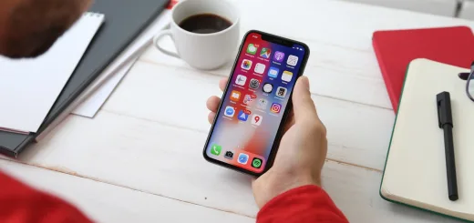 person holding space gray iPhone X