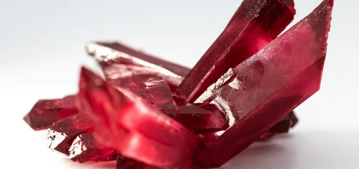 selective focus photo of red gemstone